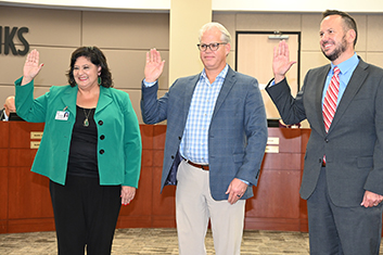  new board trustees take the oath of office on Dec. 9, 2021